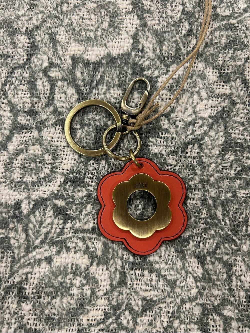 HOBO- Orange Flower Leather Key Fob with Brass-Tone Accent